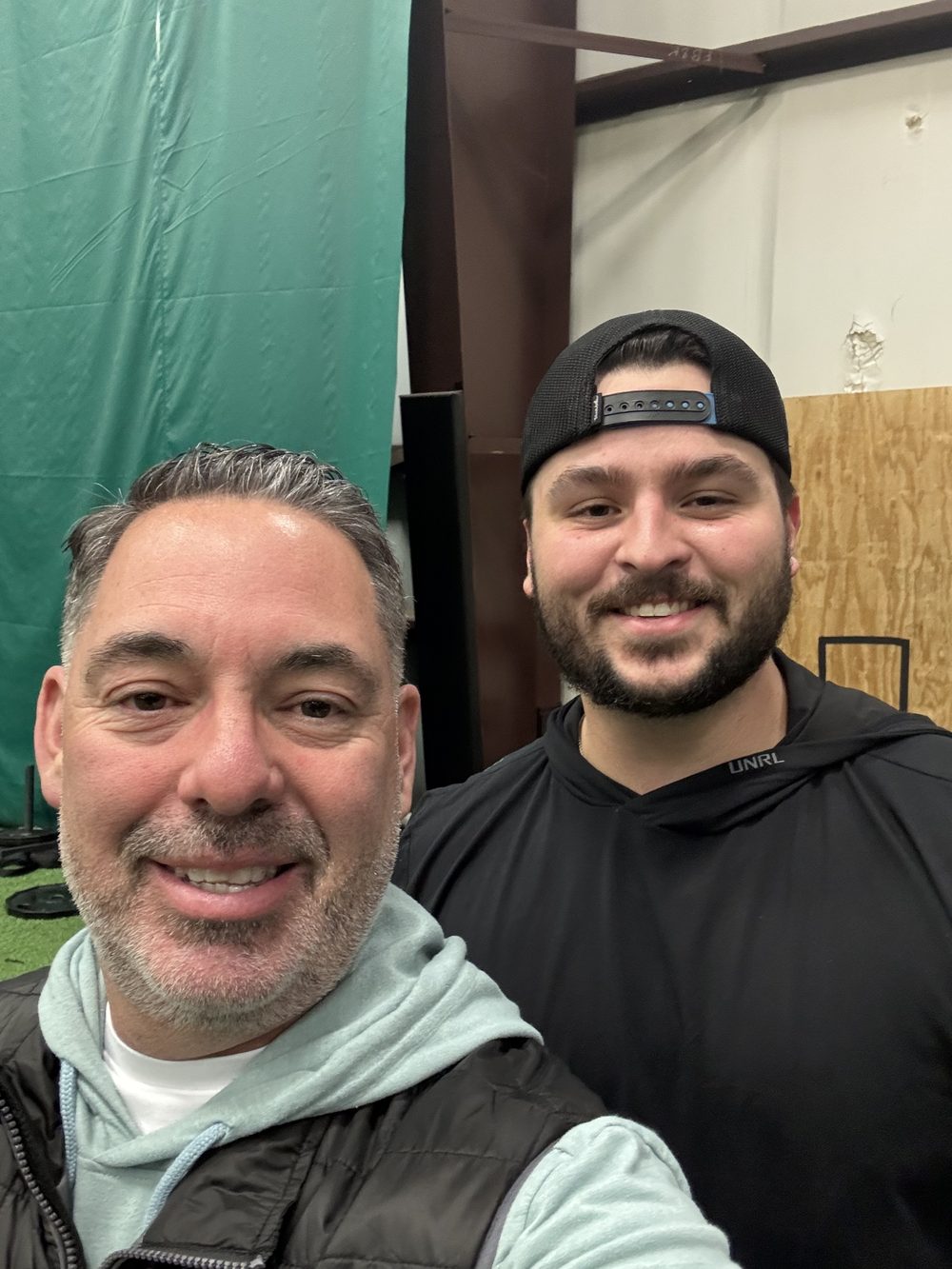 Aaron with St. Louis Cardinals catcher Jimmy Crooks at a training facility